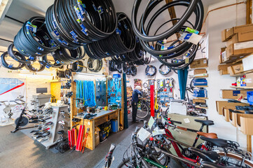 Bicycle mechanic working in bike shop
