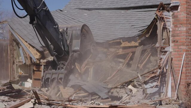 Abandoned house being demolished
