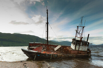 UK, ship wreck at seafront