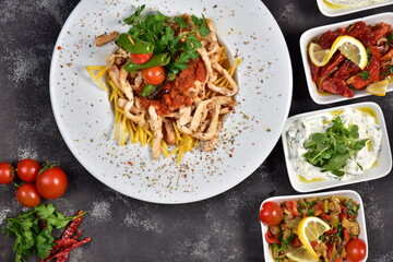 Chicken dinner and various appetizers