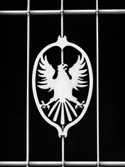 the familiar emblem to a metal gate