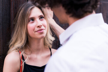 Young woman in love looking at boyfriend