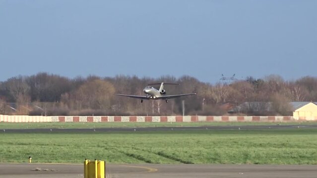 Private Jet Business jet Corporate Jet Executive Jet Taking Off Take off departure departing at Regional Small Airport Airfield