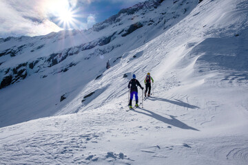 Two men doing a ski tour in Faragas mountains, Southern Carpathians, Romania