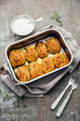 Baked Hasselback poataoes in baking tray