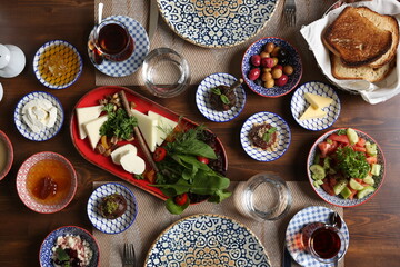 Breakfast with toast, tea and orange juice