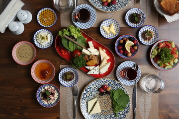 Breakfast with toast, tea and orange juice
