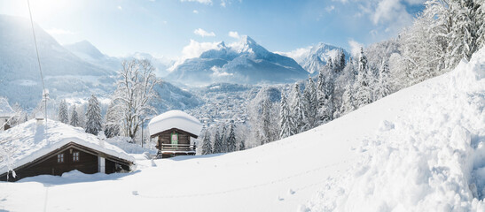 Germany, Bavaria, Berchtesgaden, Mountain hut and Watzmann in deep snow