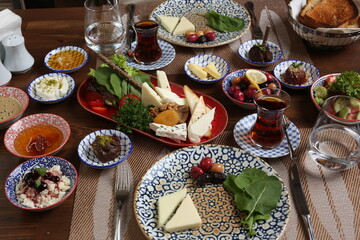 Breakfast with toast, tea and orange juice
