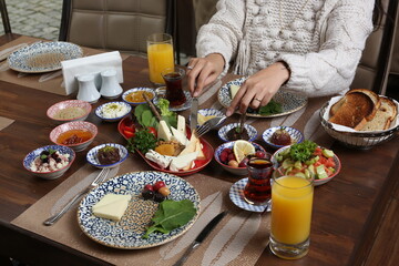 Breakfast with toast, tea and orange juice