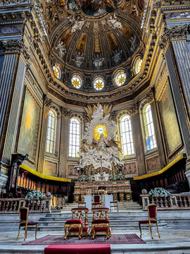  View of the interior of the Naples Cathedral, i.e. the archbishop's seat, with a dove depicting the Holy Spirit in the main altar.