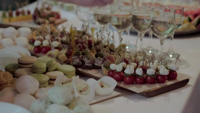 Food at the event canapés and finger food. Catering business buffet table catering at the event corporate birthday celebration for childrens party or wedding. 