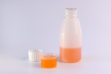 Medicinal syrup and a vessel with liquid volume divisions. Treatment and prevention of diseases. Strengthening immunity.