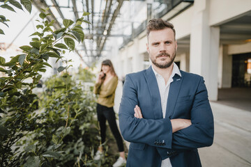 Portait of confident businessman outdoors