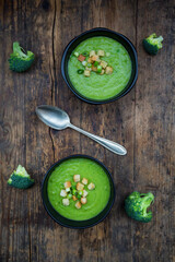 Broccoli soup in bowl, croutons