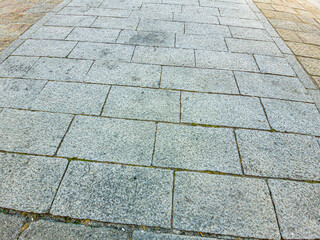 Background. Stone slabs on the pavement