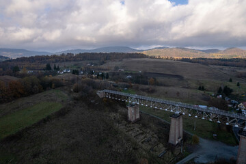 Naklejka premium Southern Poland landscape, mountains, autumn, day, sun, sky, clouds, Klodzka Basin, dramatic and majestic scenery