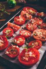 Preparation of Sun-dried Tomatoes with Thyme and Garlic on Baking Tray