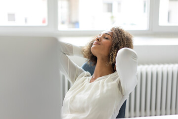 Young woman having a rest in the office
