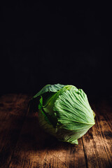 Whole White Cabbage on Wooden Table