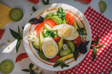 Breakfast with egg and vegetable salad