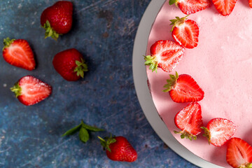 Strawberry cake. Menu concept. Homemade strawberry cake decorated with strawberries and mint...