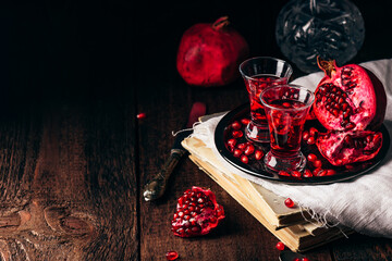 Shots of pomegranate liqueur