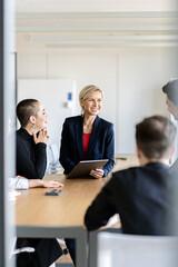 Businesswoman leading a meeting in office