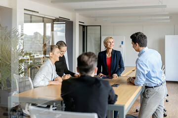 Businesswoman leading a meeting in office