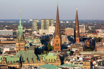 Aerial view of the City Hall, Church of Saint Peter and St. James' Church in Hamburg