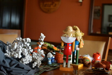 Wooden Dolls and Craft Items on a Table