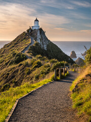 New Zealand, South Island, Southern Scenic Route, Catlins, Nugget Point Lighthouse - obrazy, fototapety, plakaty