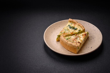 Delicious quiche with broccoli, cheese, chicken, spices and herbs
