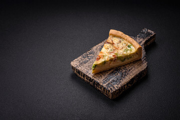 Delicious quiche with broccoli, cheese, chicken, spices and herbs