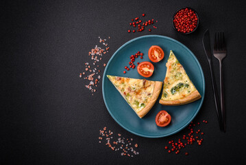 Delicious quiche with broccoli, cheese, chicken, spices and herbs