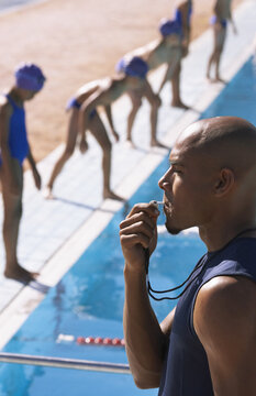 Coach Blowing Whistle