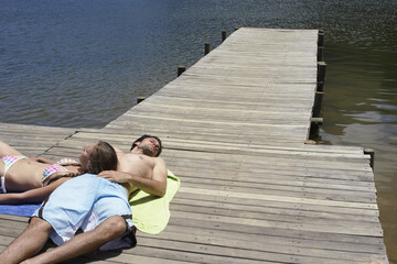 Couple Relaxing on Dock