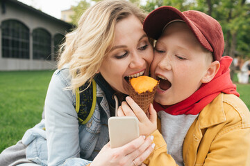 Mother and son eating ice cream together