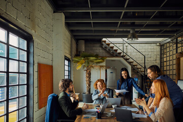 Creative Team Meeting in Modern Office Space