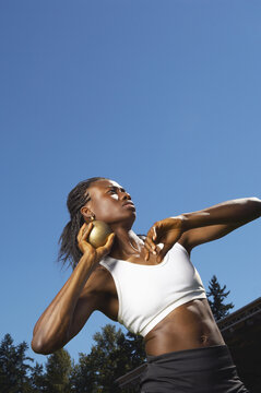 Woman About to Throw Shot Put