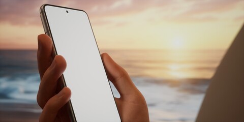 CU Caucasian man using his phone on ocean shore, blank screen mockup