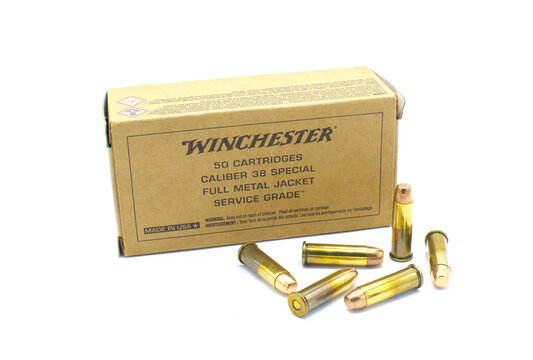 Ocala, FL November 23, 2023 Winchester brand 50 caliber cartridge full metal jacket 38 special service grade bullets ammo ammunition made in USA brown box packaging isolated on white background