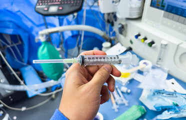 hospital medications and syringes showcasing vasopressors, anesthetics, and narcotics for medical treatment and procedures