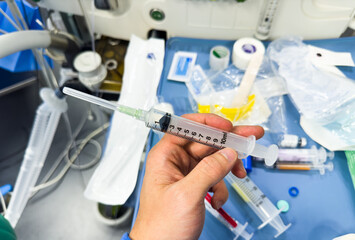 hospital medications and syringes showcasing vasopressors, anesthetics, and narcotics for medical treatment and procedures