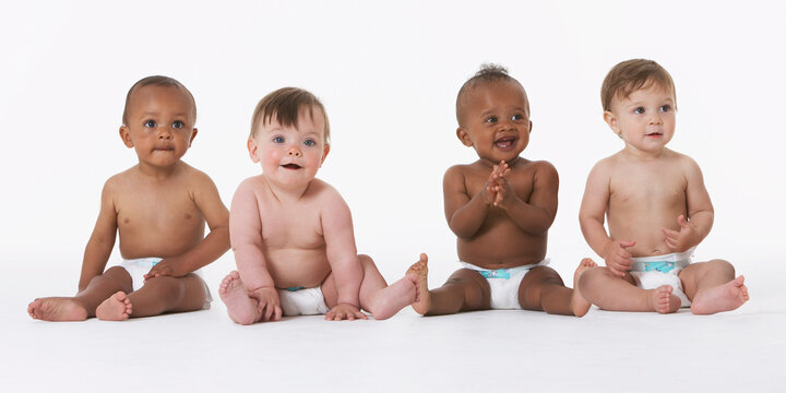 Row of Babies in Diapers