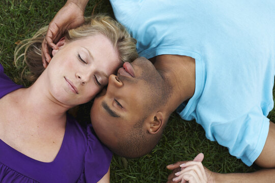 Couple Lying in Grass
