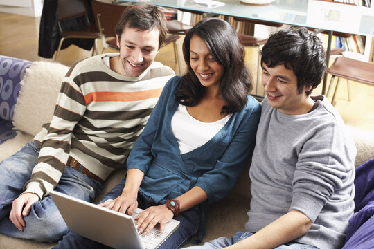 People Looking at Laptop Computer