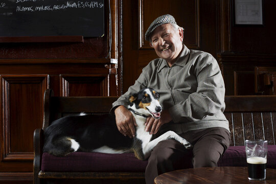 Man With Dog in Pub