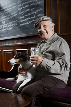 Man With Dog in Pub