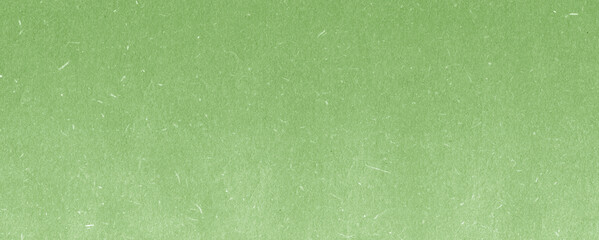 Recycled green paper background and texture. Craft eco textured paper sheet background beige color for cards and other design ideas beige color.White paper texture with particles. Paper background